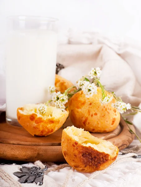 stock image Jug with milk, bread and wild flowers on a white background