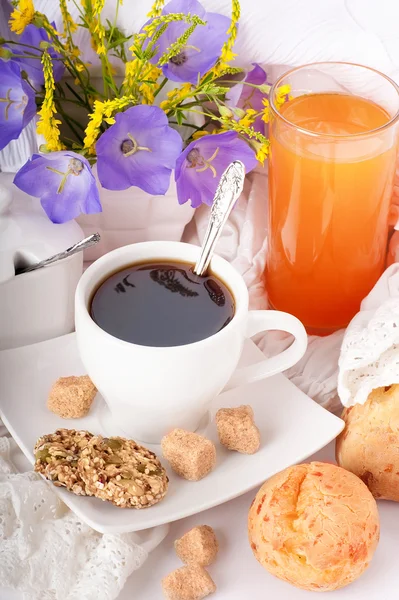 Breakfast from coffee with rolls, juice on delicate serviettes — Stock Photo, Image