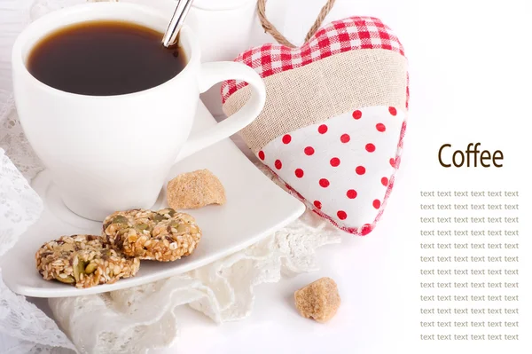 Cup of coffee, bread and red heart on a white background — Stock Photo, Image
