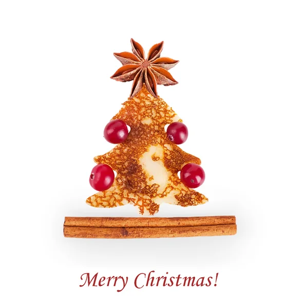与圣诞浆果和糕饼形式的杉木树和星级煎饼 — 图库照片