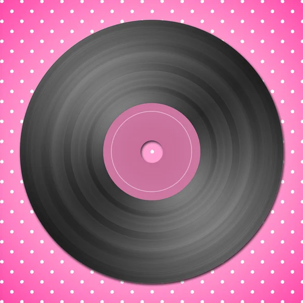 ピンクの点線の背景に黒のビニール レコード — ストック写真