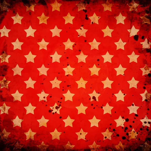 Röd grunge bakgrund med stjärnor — Stockfoto
