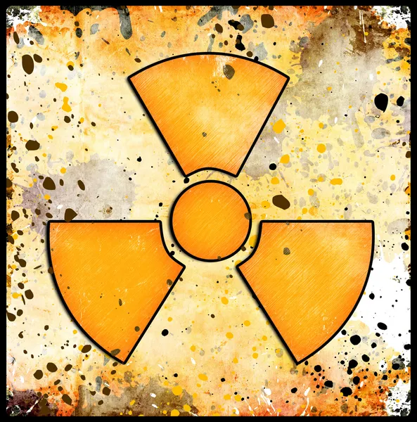 Teken van straling op grunge — Stockfoto