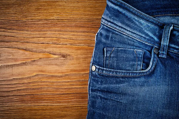 Jeans auf Holz — Stockfoto