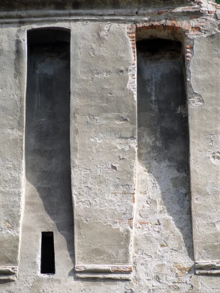 Nahaufnahme eines Hauses rustikale Verkleidung simuliert eine Trockenmauer — Stockfoto