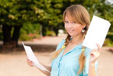 Beautiful young student girl with letter clipart