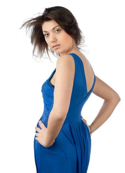 Mooi en sexy jonge vrouw in blauwe jurk — Stockfoto