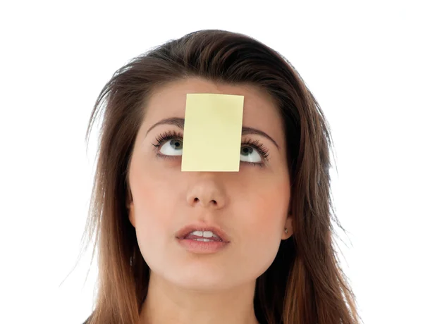 Surprised woman with note on her forehead — Stock Photo, Image