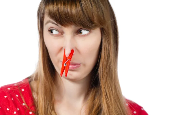 Girl with clothespin on her nose — Stock Photo, Image