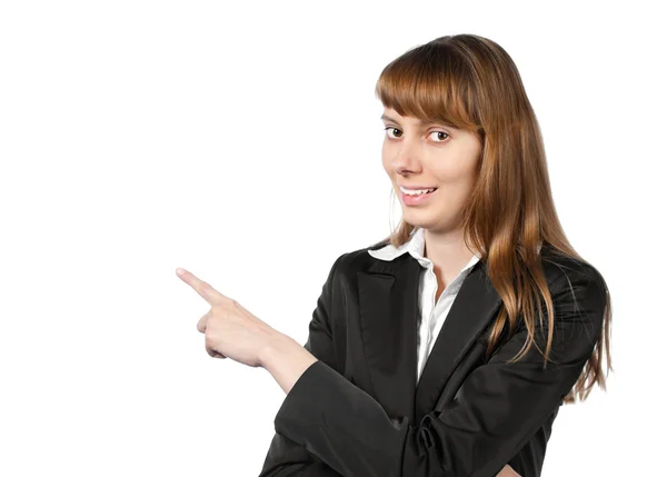 Young businesswoman pointing to the side — Stock Photo, Image
