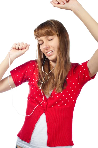 Vacker flicka lyssnar musik — Stockfoto
