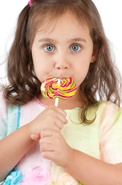 Little girl eating lollipop — Stock Photo, Image