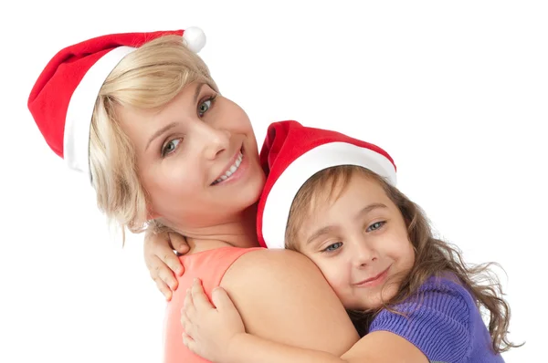 Мати і дочка разом у різдвяних капелюхах — стокове фото