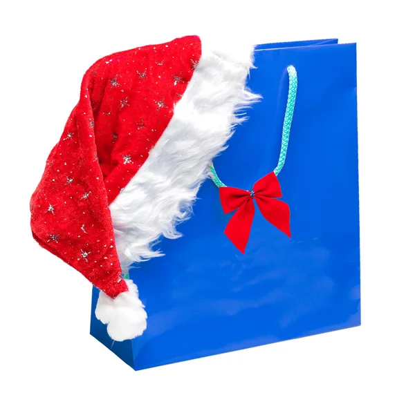 Paquet bleu avec chapeau de Père Noël — Photo