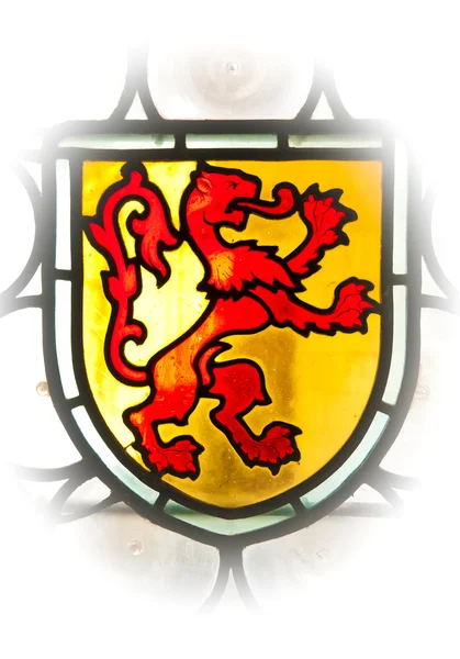 Gamla fönster med lion emblem — Stockfoto