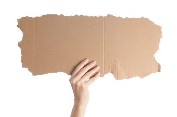 Woman hand holding empty piece cardboard — Stock Photo, Image