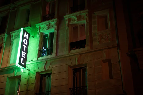 Illuminated hotel sign. — Stock Photo, Image