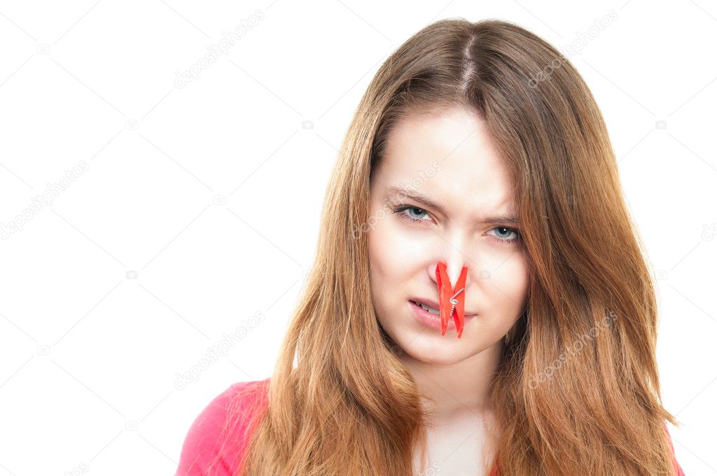 Girl with clothespin on her nose. — Stock Photo © kyolshin 11436567