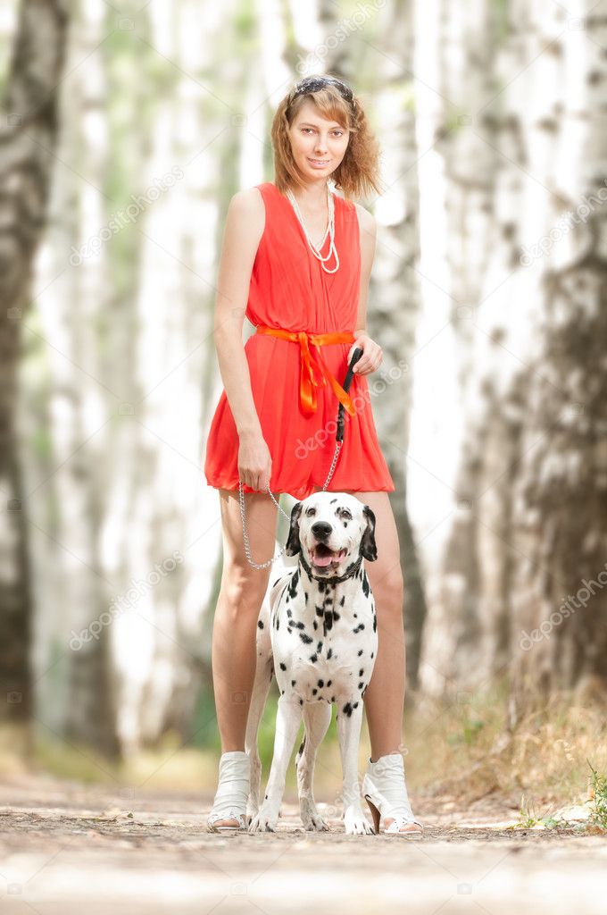 Sexy young woman with dog. Stock Photo by ©kyolshin 11437006