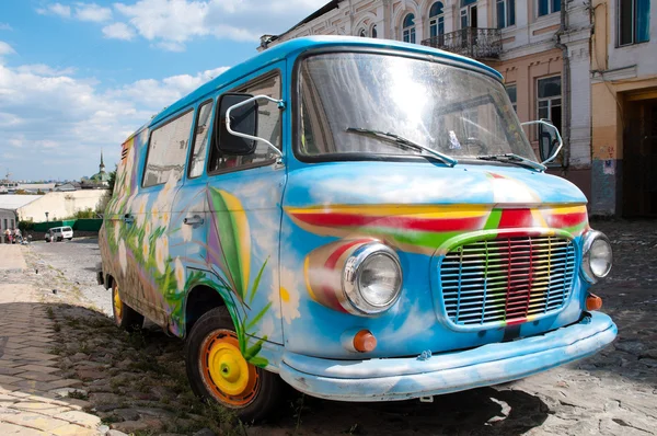 Old painted car in street — Stock Photo, Image