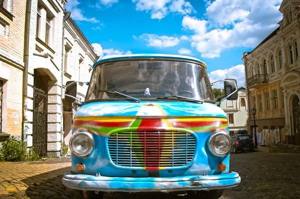 Old painted car in street — Stock Photo, Image