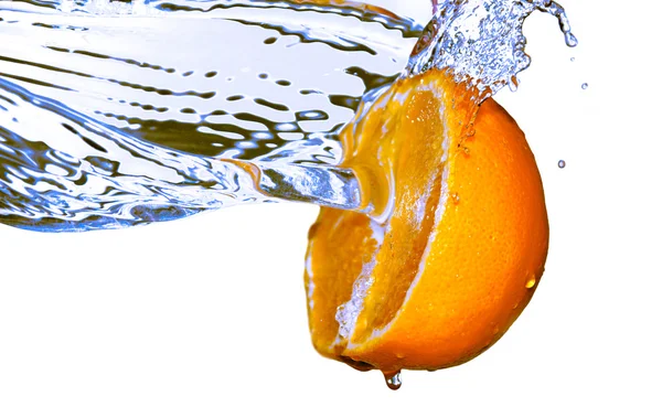 Water splash on orange — Stock Photo, Image