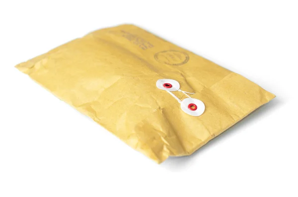 Closed yellow parcel — Stock Photo, Image