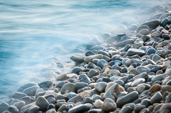 Piedras de guijarro junto al mar —  Fotos de Stock