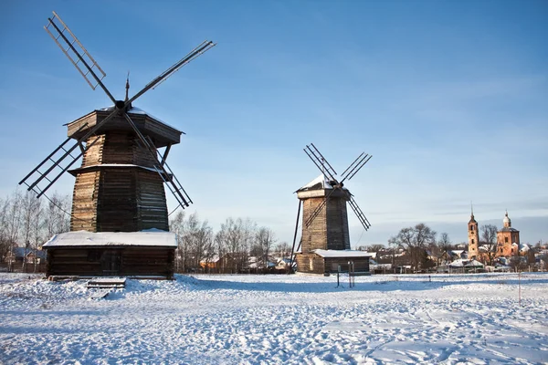 Two windmills and church — Stock Photo, Image