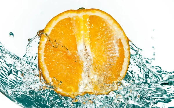 Splash Water σε πορτοκαλί Εικόνα Αρχείου