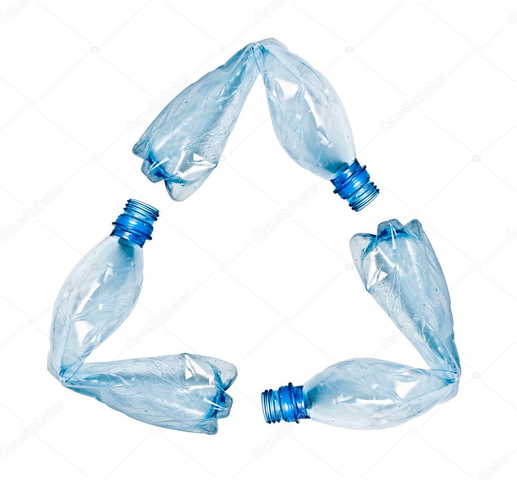 Plastic bottles making up recycle symbol
