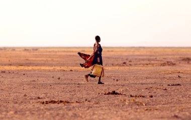 Carrying water of Tribeswoman Kenya, Africa clipart