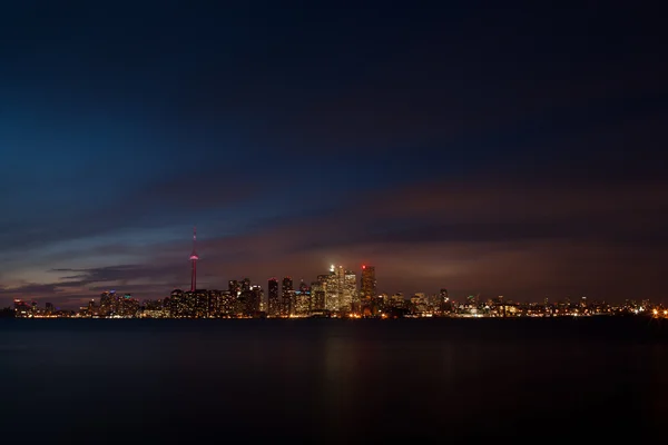 stock image View of a illuminated city and sea at night toronto ontario canada