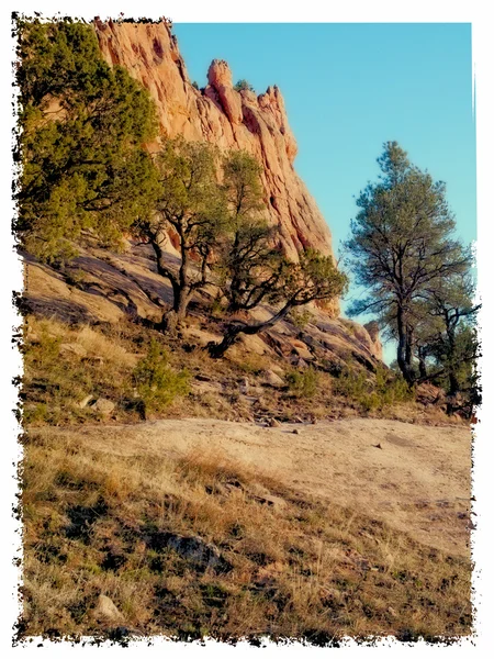 Red rockface and blue sky — Stock Photo, Image