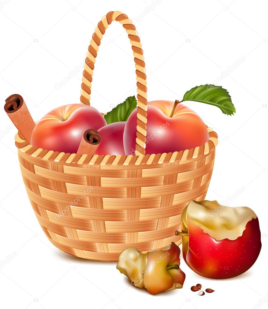 Red ripe apples with cinnamon in the basket.