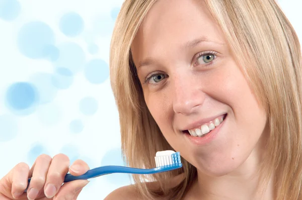 stock image Young Woman Brushing Teeth