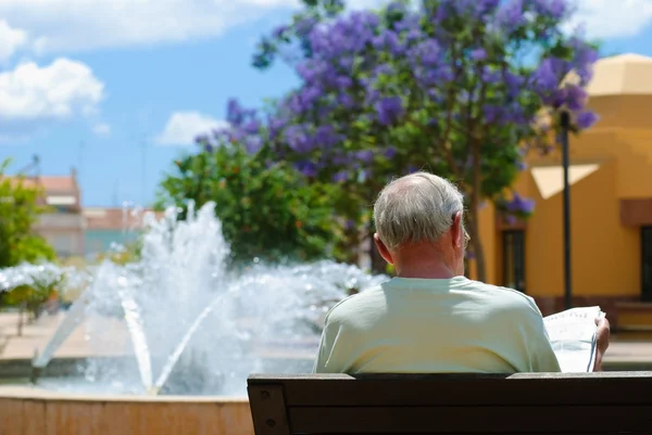 stock image Senior Reading Newspaper