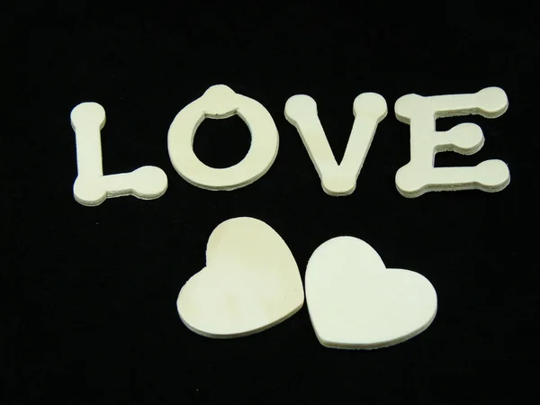 A palavra amor e dois corações — Fotografia de Stock