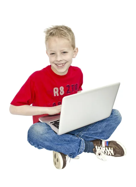 Junge auf Laptop — Stockfoto