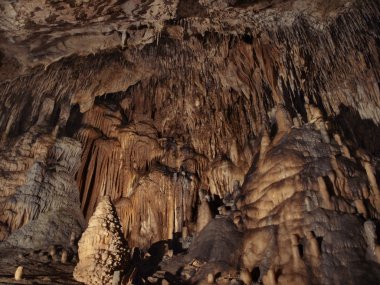 cave with stalactites pipes clipart