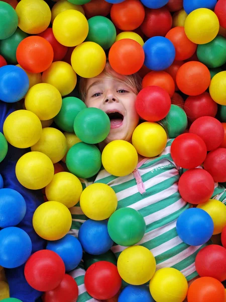 Fille dans amusant boules — Photo