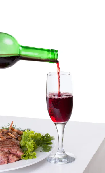 stock image A delicious steak with red wine