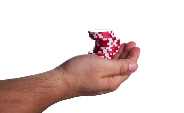 Red poker chips on the hand isolated on white — Stock Photo, Image