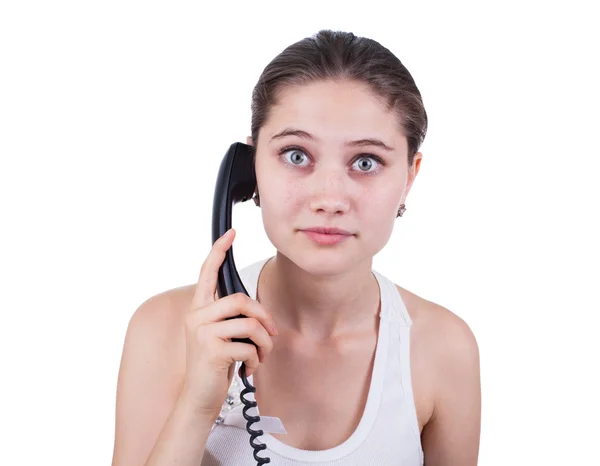 The girl is seriously talking on the phone — Stock Photo, Image