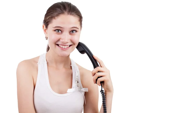 Vacker flicka talar med telefonen känslomässigt isolerade på vit — Stockfoto