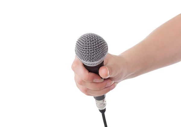 stock image Microphone in hand isolated on white