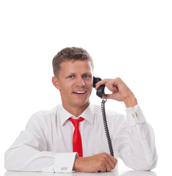 Happy business man with phone winning — Stock Photo, Image
