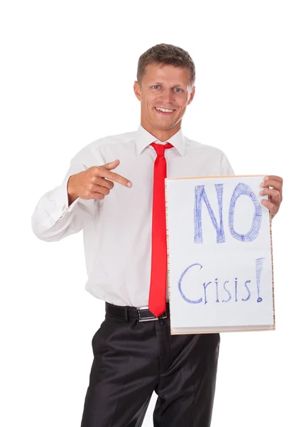 Portrait of smiling young man holding a sign in hands — Stock Photo, Image