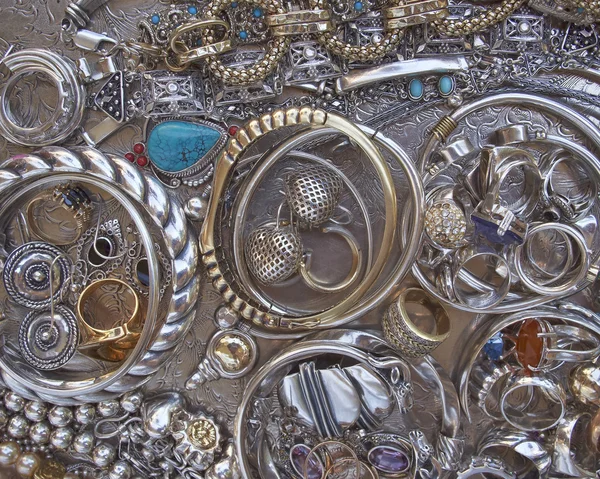 Gold and silver jewels closeup — Stock Photo, Image