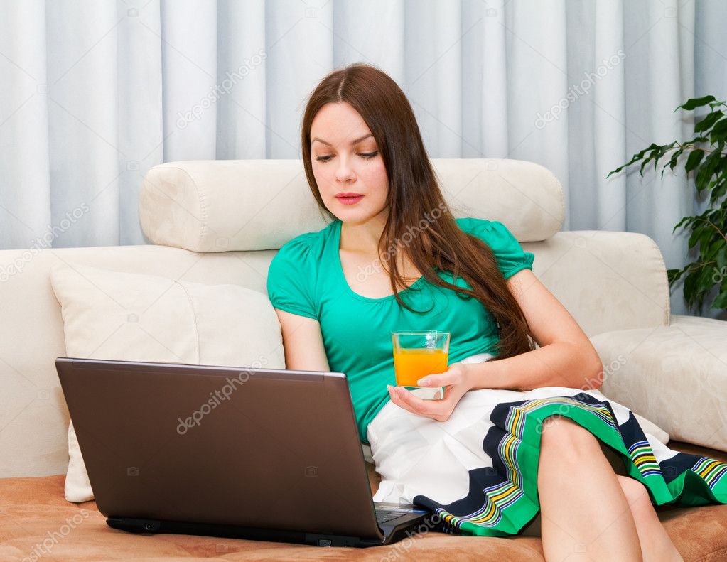 Atractive woman working on her laptop